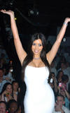  Kim Kardashian shows her ass in body hugging white dress at Whitehouse nightclub inHamptons