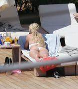 Rita Ora - wearing a bikini at a pool in Ibiza 07/07/2013