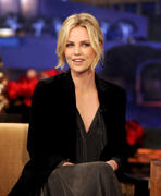 th_90979_CharlizeTheronTonightShowWithJayLenoDEC_12_2011HQx18_18_123_484lo.jpg