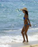 Eva Longoria in a blue bikini on the beach with friends in St Tropez
